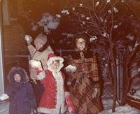 Rivka Weiss Goldstein (tan coat). Yitzi Weiss (blue coat), Rachel Weiss Feit (red coat), Sheryl Cohen (friend in plaid coat)