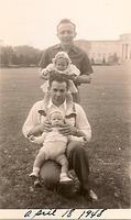 Morris Tulchinsky holding Linda Tulchinsky Siegel and Louis Cohn holding Les Cohn, April 18, 1948