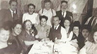 Cake cutting at the wedding of Fannie Cohn Cohen and Sammy Cohen.  Nov 18, 1945