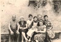 Nuta Komar, Esther (Fira) Komar, Tziporah Polsky, Yakov's grand niece Rita, Yakov, Roza Shatajko Komar, 1961. See notes.