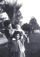 Fannie Cohn Cohen w/ Libby Cohen Needle holding Harvey. Jacksonville, FL,  1953