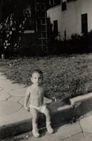 Libby Cohen Needle sitting on steps of house on 8th Street, Jacksonville, FL. 1947/48