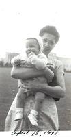 Esther Baellow Wolfson holding Les Cohn, April 18, 1948