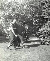 "Helen and Abe Ribakoff (siblings) on our front lawn, Nov 10, 1949" (front)