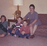 Chanukah with Anna Schlomovitz Choikhit with Caron Choikhit Kramsky, Steve Choikhit, and Kenny Choikhit. 1963