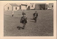 Larry Clootz w a friend in the backyard