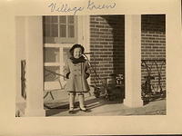 1949 - Marcia Clutz Tropp at home at the Village Green (town house)