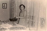 1950 - Naomi Pelofsky at sons Joel's BM reception at home.