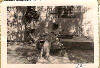 Linda Clutz Cohn in the Taylor Tot w Marcia Clutz Tropp in the back, 1952