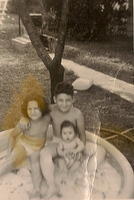 1953 - Larry, Linda, Marcia swimming.jpg