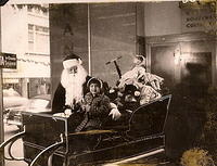 1955 - Linda Clutz Cohn with Santa