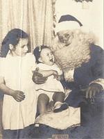 Marcia Clutz Tropp and Linda Clutz Cohn w Santa Claus, 1952