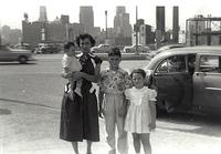 Thelma Hecht Clutz holding Linda Clutz Cohn, Larry Clootz, Marcia Clutz Tropp.  New York, NY