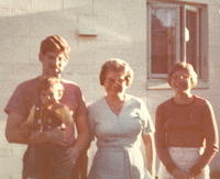 Herb Siegel holding Adam, Eva Cohn Tulchinsky, Linda Tulchinsky Siegel