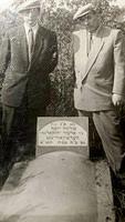 Henry (Henryk) and Max (Meyer) Herszkowicz at the grave headstone of Szlama Jósef Hershkowitz, Lodz, Poland