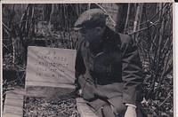 Majer Jakubowicz at the headstone monument of his step mother, Sara Raca Jakubowicz.  Dec 4, 1942 in Lodz, Poland.  She was murdered at the age of 54