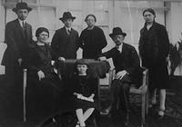 Bleier Family: Avraham, Rivka Weinblum Bleier, Yitzchak, Rosza, Naftali Mordechai Laib Markus, Serena Bleier Bunzel, seated: Violet Bimbi Ibby Bleier Silvern.  Senta, Yugoslavia. Abt 1927.  See notes.